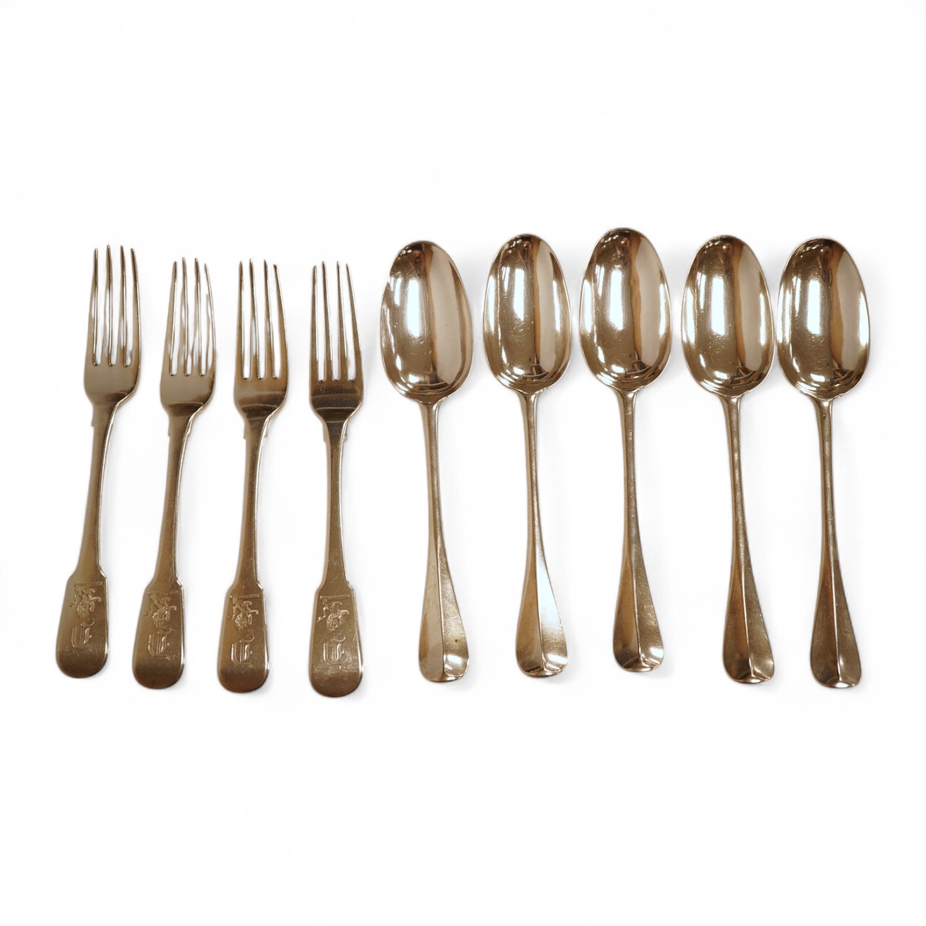A set of five George I silver Hanoverian rat-tail pattern table spoons by Samuel Hitchcock, London, 1725 and four George IV silver fiddle pattern table forks, with engraved initial and crest, William Bateman, London, 182